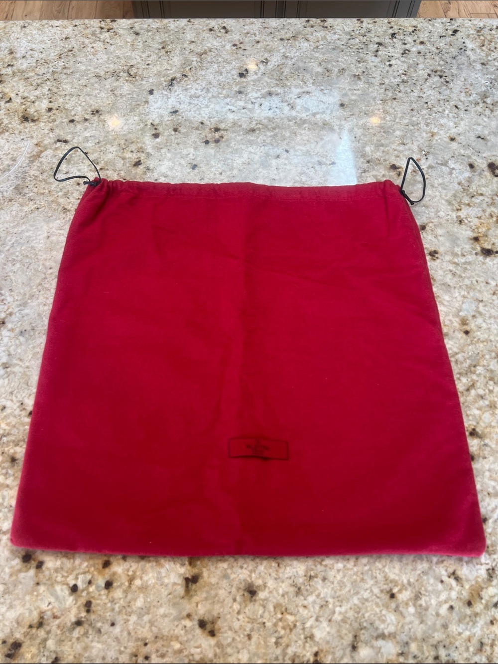 VALENTINO GARAVANI RED DUST BAG with a black drawstring tonal BRAND TAG